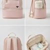 7ab60a3c-d4f7-4847-b19a-a10287d9d7d9 (1) Light Pink And White Patterned Backpack
